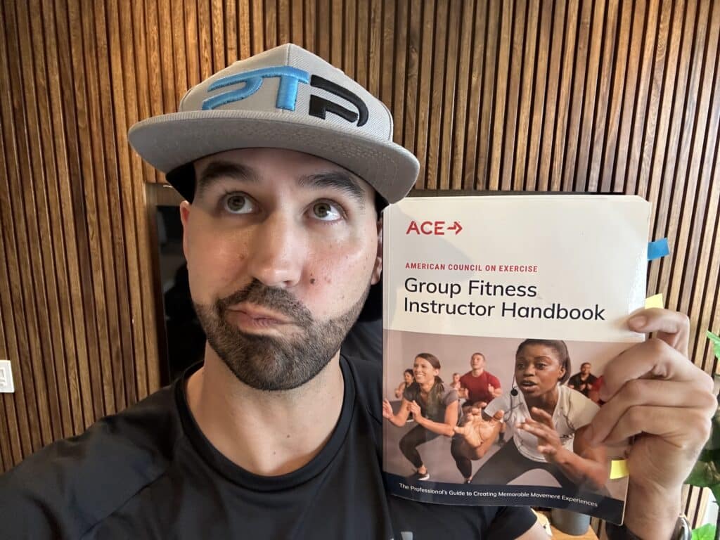 The Ultimate ACE Group Fitness Instructor Review 14 Ace group fitness instructor - Tyler holds up ace textbook - is the ace gfi worth it