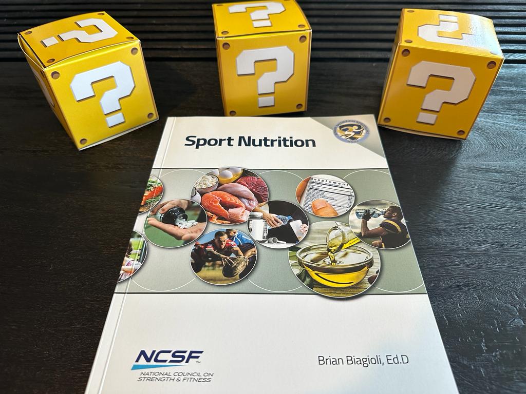 How to pick the best nutrition coach certification (Updated) 54 best nutrition certs - ncsf nutrition certification laid on table with yellow question mark boxes