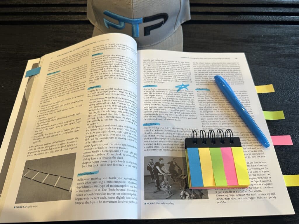 ACSM Group Exercise Instructor (ACSM-GEI) Review 21 acsm group exam prep study materials - ACSM GEI textbook opened with highlight