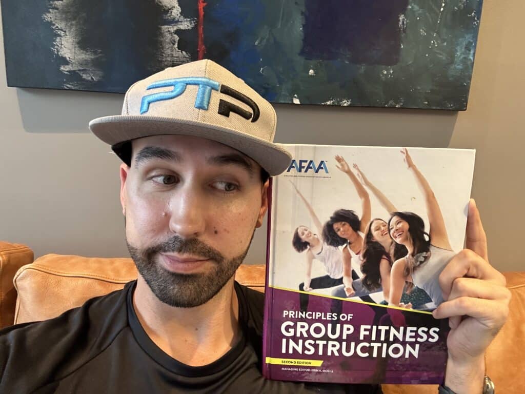 AFAA Group Fitness Instructor Certification Review 13 AFAA Group Fitness Instructor Certification Review - Tyler Read holds up the AFAA GFI