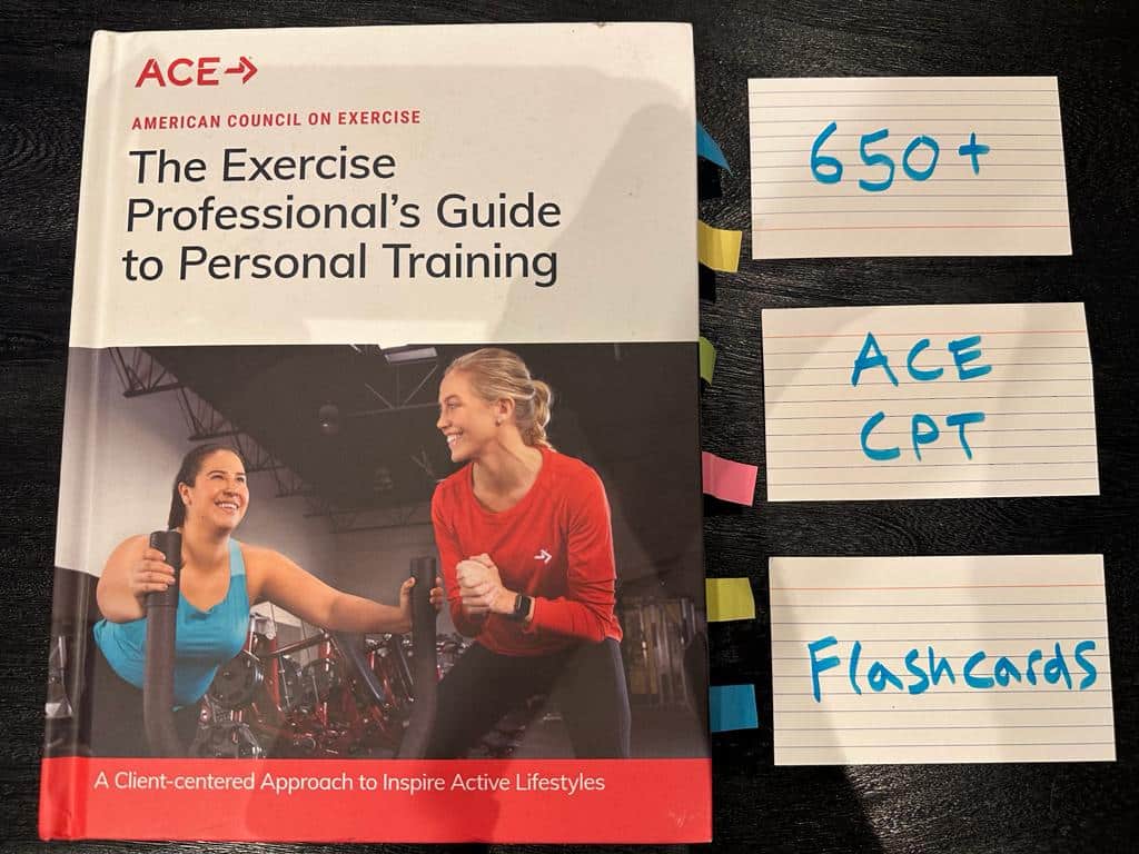 Free ACE CPT Flashcards - Over 650 cards 3 ACE personal trainer certification flashcards. ACE CPT textbook on table with study flashcards.