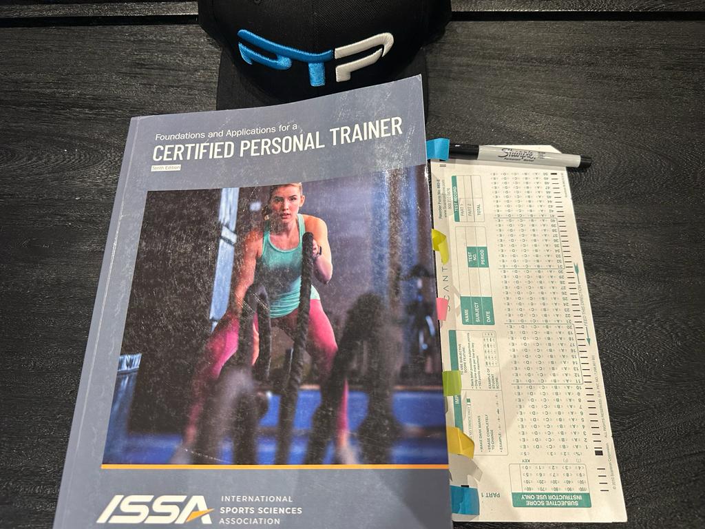 ISSA Practice Test – 280 Real Exam-Style Questions 18 ISSA practice tests - ISSA personal trainer textbook laid out with ISSA exam scantron sheet to take the ISSA practice exams.