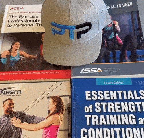 Tyler opens up NASM textbook to page about the Single Leg Squat assessment