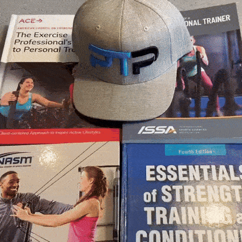 GIF of Tyler Read opening NASM textbook to balance exercises