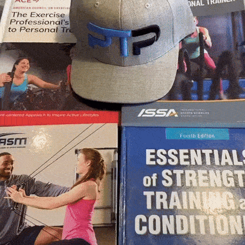 GIF showing Tyler Read open NASM textbook to page on heart zone training