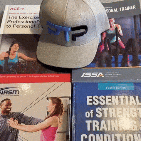 Periodization gif of Tyler Read opening NASM textbook to periodization chapter