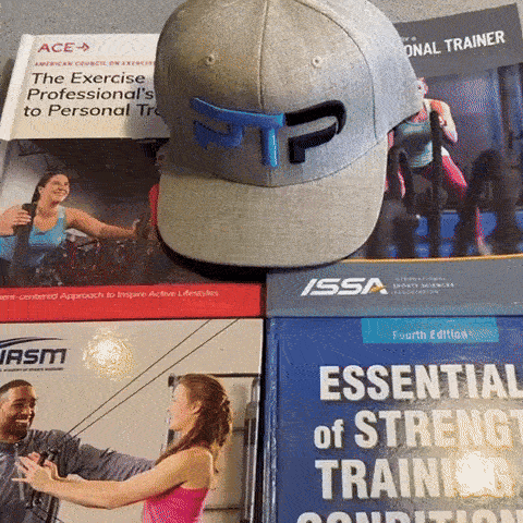 GIF of Tyler Read opening NASM book and pointing to page on the static postural assessment