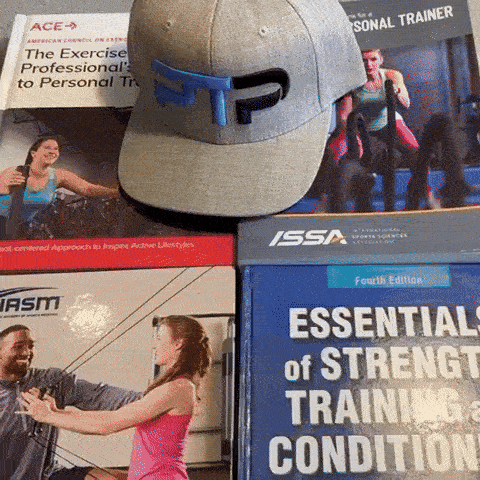 Tyler Read opens NASM textbook to section on Protein Intake