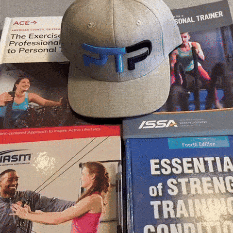 Tyler Read opens NASM textbook to page on SAQ training