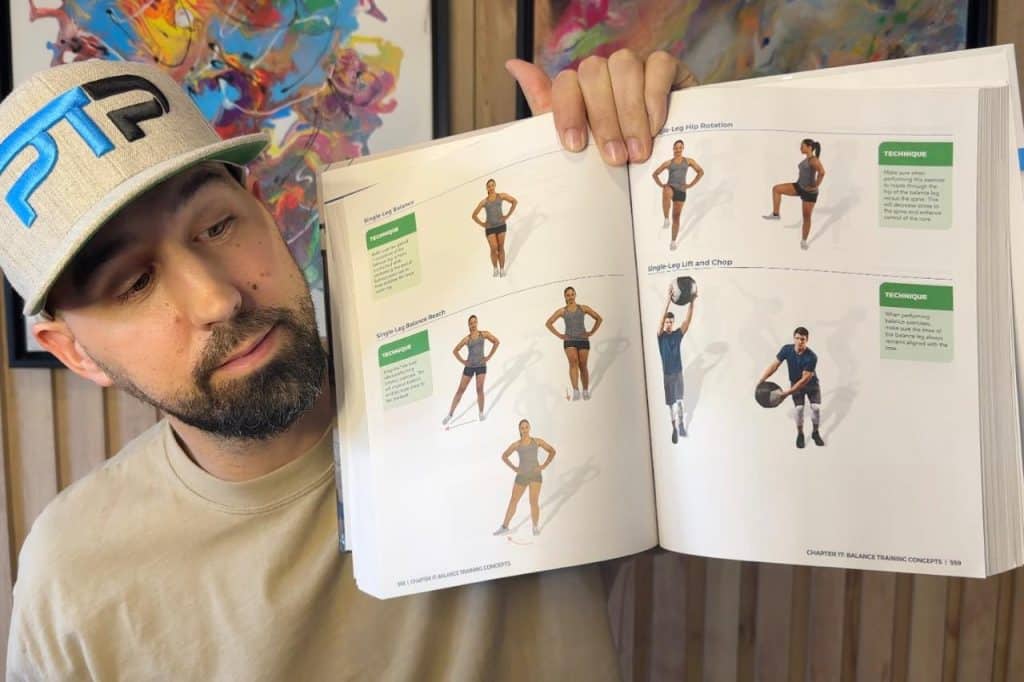 Tyler Read opens NASM textbook up to page on Balance Exercises 