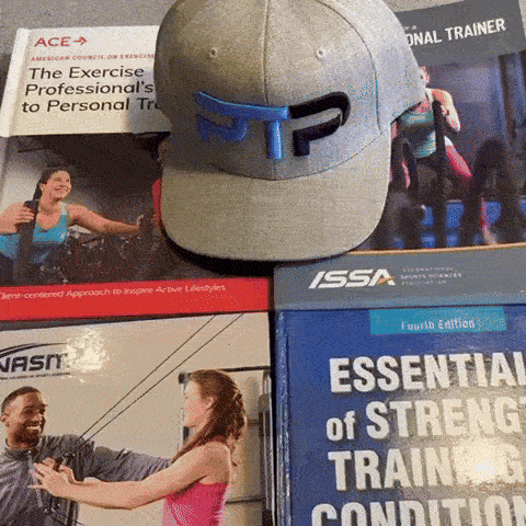 Vertical Loading GIF of Tyler Read opening NASM textbook to page on vertical and horizontal loading